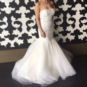 This is a gorgeous off white wedding dress.